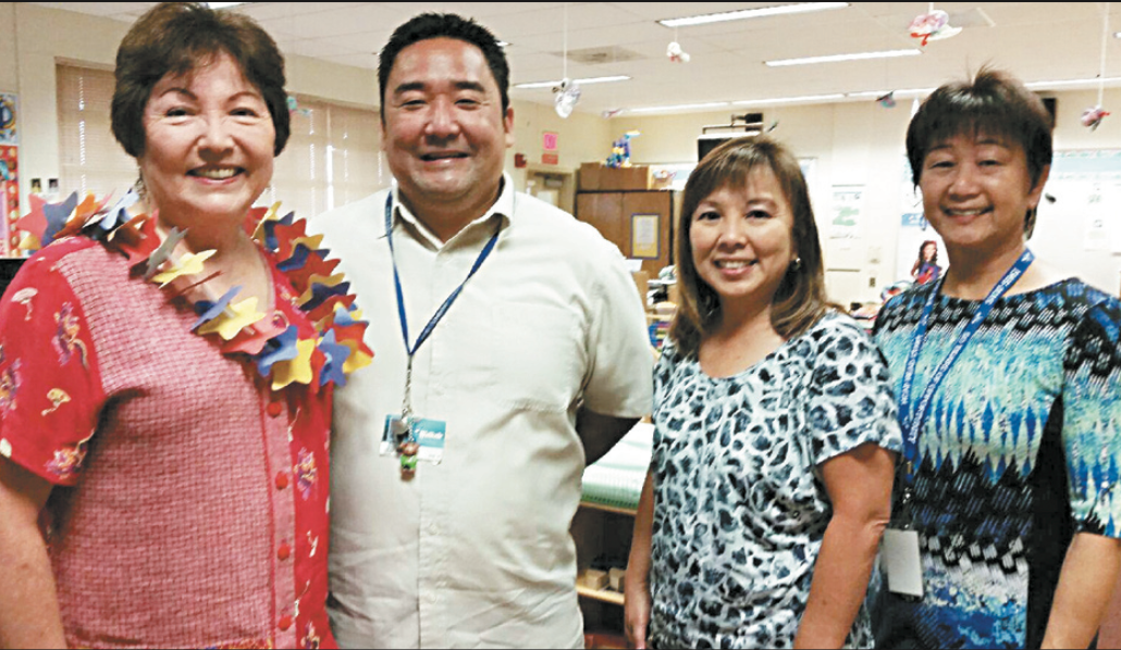 Head Start, celebrating its 50th anniversary this year, put on a Read Aloud event at Waikele Elementary. Pictured are (from left) state Sen. Michelle Kidani, Waikele vice principal Kevin Ginoza, Kapolei-to- Waipahu Head Start program manager Suzie Uyeda and Head Start director Lynn Cabato. PHOTO FROM SEN. KIDANI’S OFFICE.