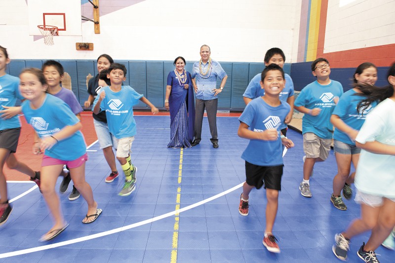 Rotary International president K. R. “Ravi” Ravindran and wife Vanathy were delighted to spend an afternoon at the Boys & Girls Club Spalding Clubhouse, which local Rotarians are renovating. Photo by Nathalie Walker.