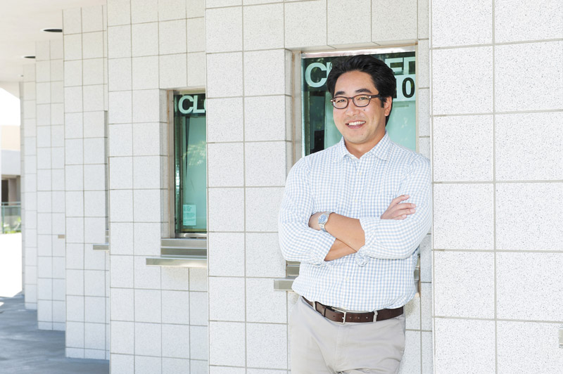 Jon Kobayashi, the man now heading Ahahui Koa Anuenue, the fundraising arm of UH Athletics, is a familiar face on Bishop Street, and he's looking for support from there as well as from ‘Main Street.' He's also taking an aggressive approach in creating new revenue streams. PHOTO BY NATHALIE WALKER 