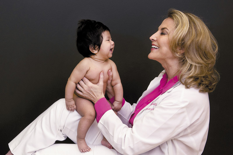 Dr. Angela Pratt with 3-month-old Ava Rose Furutani. PHOTO BY NATHALIE WALKER