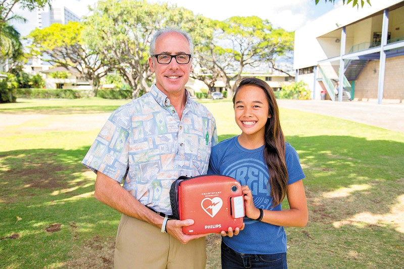 Malia Benn with Iolani teacher Peter Greenhill PHOTO COURTESY HEART START HAWAII