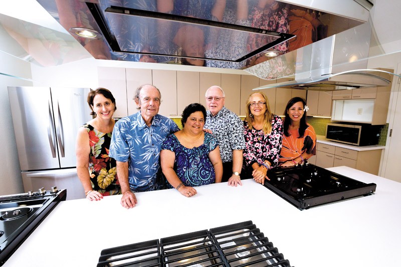 American Cancer Society director of major gifts campaign Cathy Alsup, Charles Roessler of Kauai, Jacqueline Nalani Perreira of Maui, campaign cabinet member Larry Rodriguez, Alicia Bicoy of Molokai and Debra-Jean Kenui of Hilo in the modern kitchen of the newly built Hope Lodge Honolulu