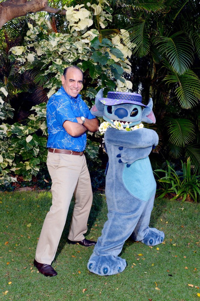 Disney vice president of hotel operations Elliot Mills with Stitch