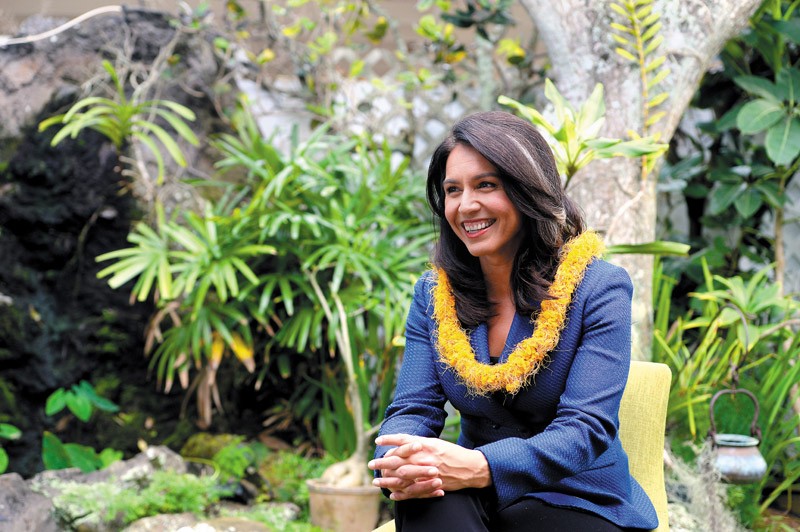 Tulsi Gabbard in the backyard of her Kailua home 