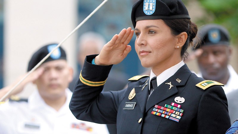 Maj. Tulsi Gabbard salutes the flag at the National Memorial Cemetery of the Pacific (Punchbowl) PHOTOS COURTESY TULSI GABBARD 