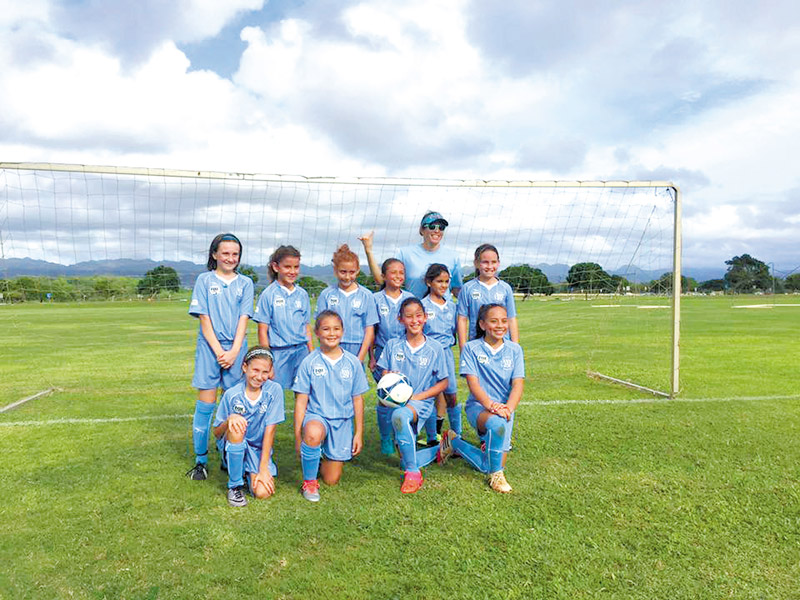 Kailua Strikers girls U10 team after they won first place at the Islands Best Tournament Dec. 17 and 18 at Waipio Soccer Complex. Pictured are Ava, Risa, Cheye, Mahina, Addy, Mahana, Alyssa, Charlotte, Olivia and Havea with coach Amber Kuhlman.