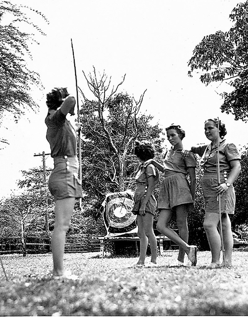 Girl Scouts practicing archery at Camp Maunawili in the 1940s. Archery continues to be a favorite sport among today's Girl Scouts 