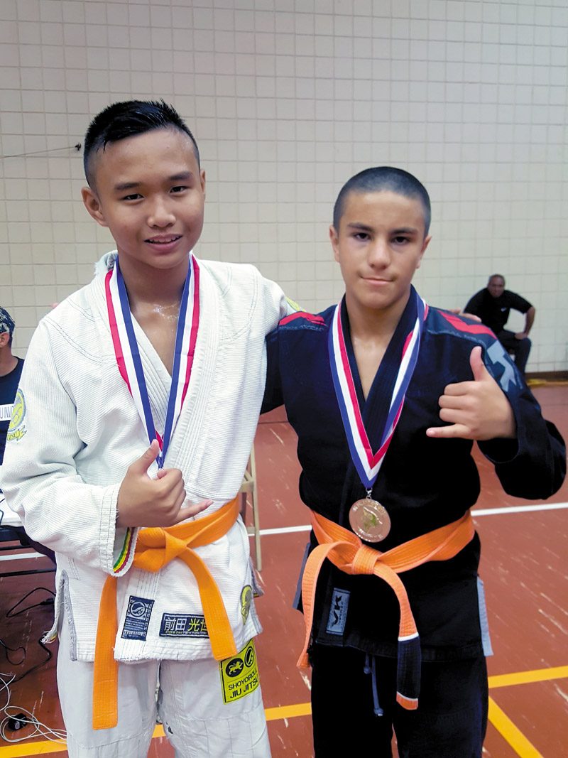 Tysen O. (Gold) and Hunter A. (Silver) at the Big Island Jiu-jitsu Invitational Feb. 18
