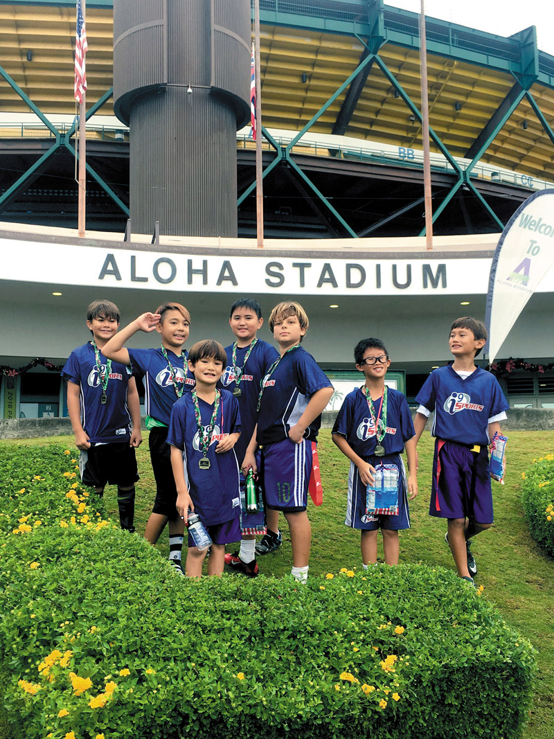 The Lightning Bolts U10 i9 Sports flag football champs at Aloha Stadium