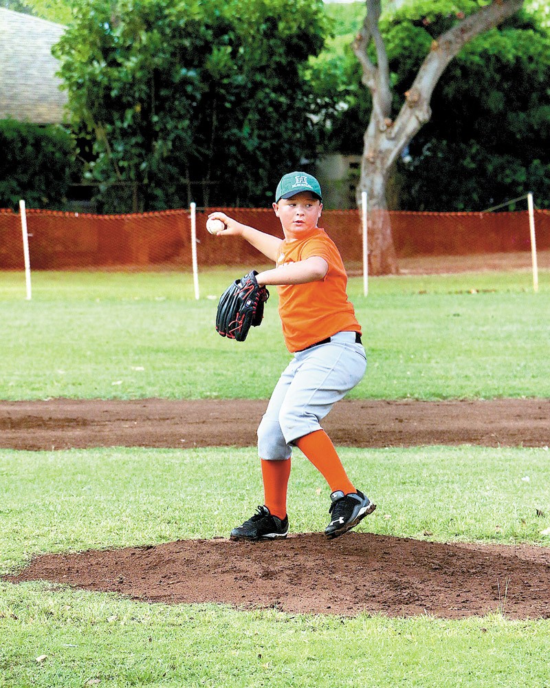 Ten-year-old Randy ‘R.J.' Otto, who plays for Wai Kahala Tigers, dreams to play for University of Hawaii one day.