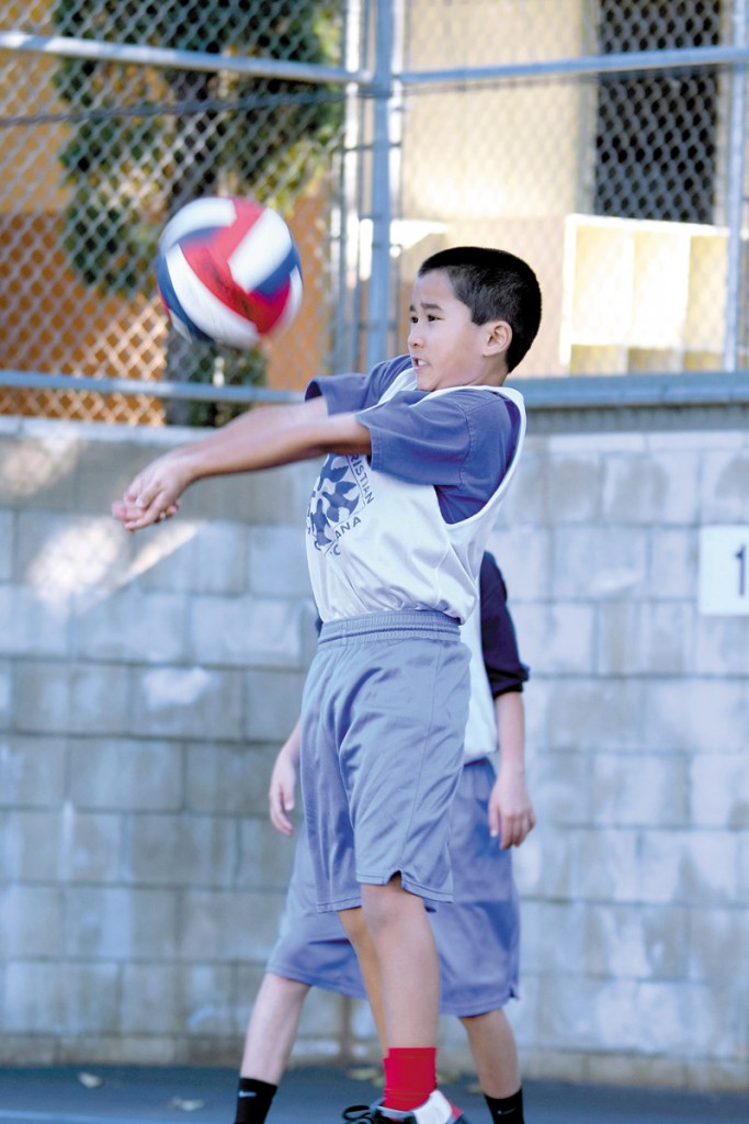Joseph Yamauchi of Kaimuki Christian School passes the ball during a match against Maryknoll in the Christian School Athletics League.