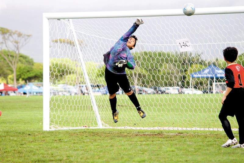 Noah Sabey, goalkeeper for Pipeline Soccer Club Hawaii's 2007 boys team, makes a spectacular save during an exciting 3-1 victory over Crush at Waipio Soccer Complex.