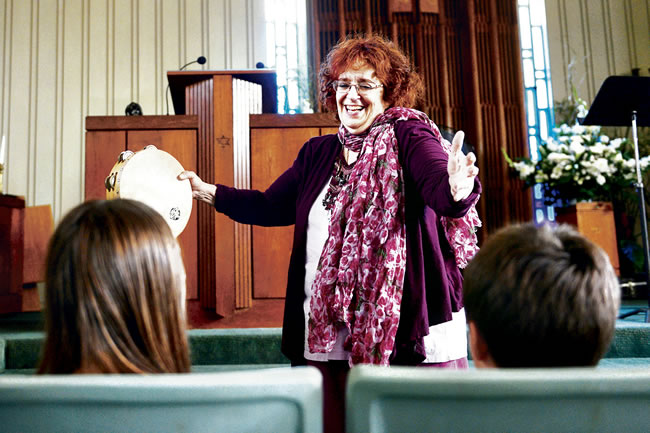 Helene Mann uses music therapy